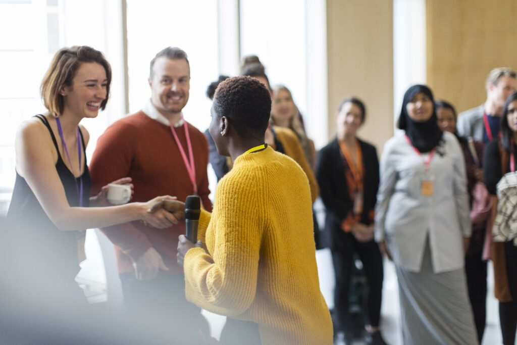 People interact during the break.